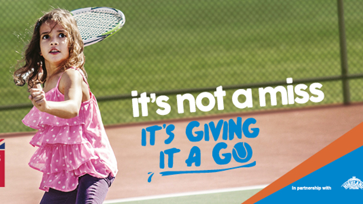 Young girl playing tennis for Tennis for Kid