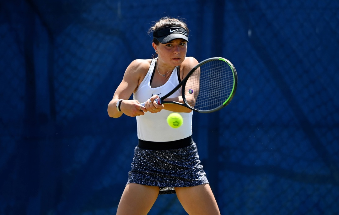 Amy Leather hits a backhand during her match against Jaquelyn Ogunwale during the 2021 Junior National Tennis Championships