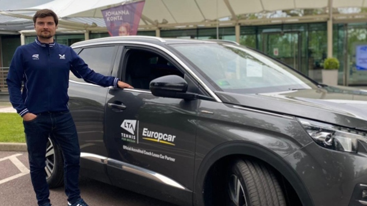 Merlin van de Braam with a Europcar outside of the NTC