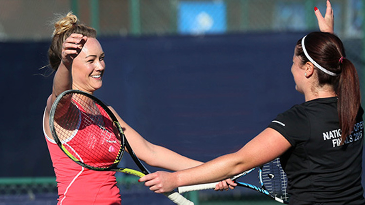 Two tennis players celebrating at the Aegon team tennis national open finals