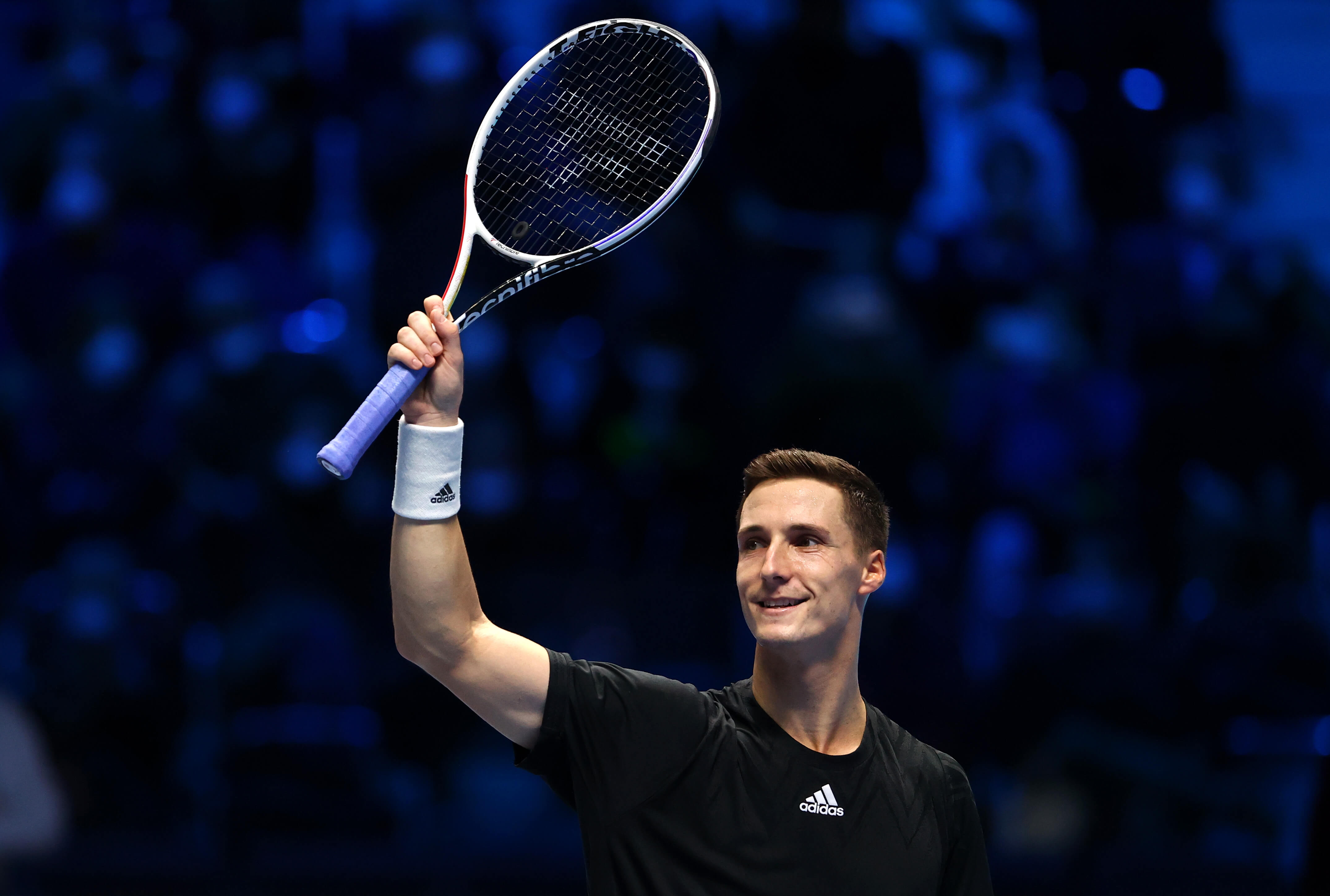 Joe Salisbury of Great Britain celebrates victory during his Mens Doubles Round Robin match against Pierre-Hugues Herbert of France and Nicolas Mahut of France during Day Four of the Nitto ATP World Tour Finals 2021 in Turin