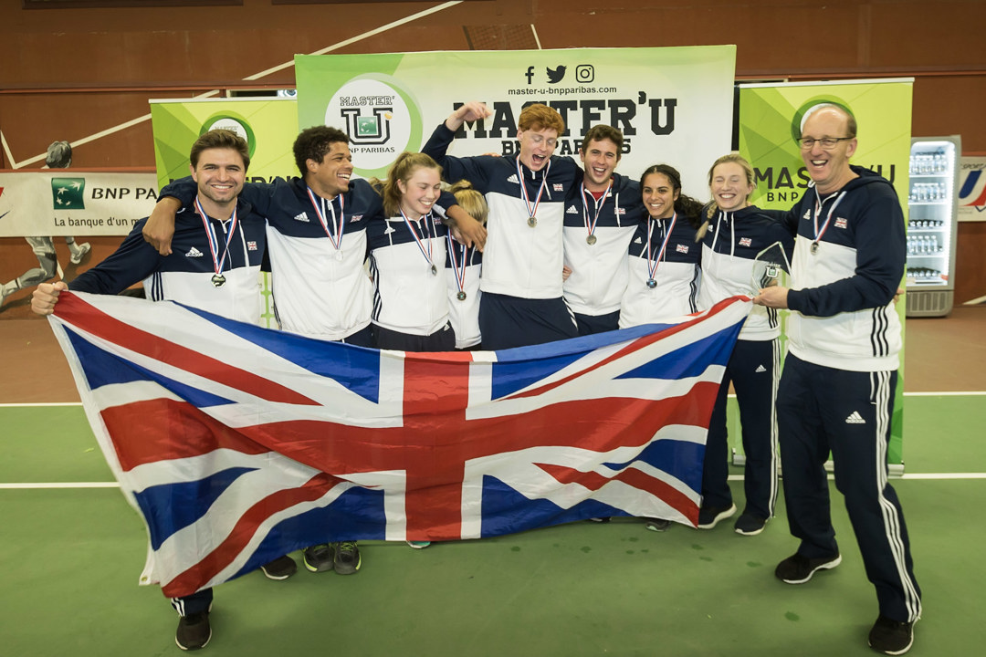 team celebrating with union jack flag