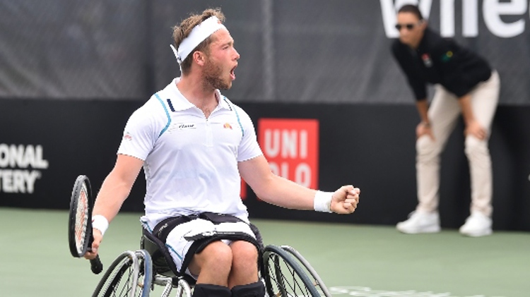 Alfie Hewett celebrating a tennis shot at the British Open