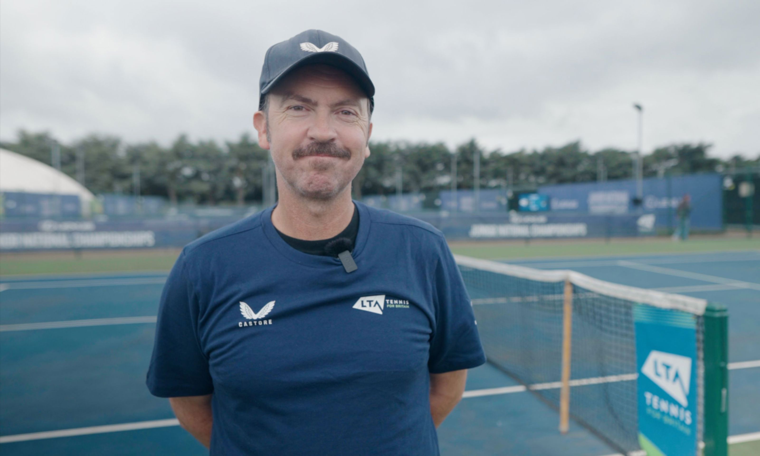 A headshot of coach, Luke Milligan