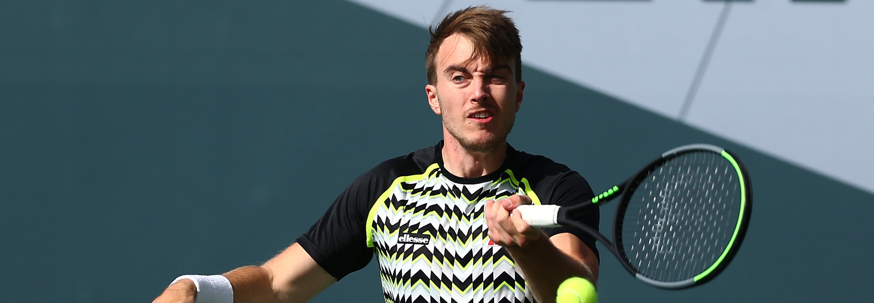 Dermot Bailey of Great Britain plays a forehand during his match against Gordon Reid of Great Britain during the LTA Wheelchair Tennis Tournament at the National Tennis Centre on September 01, 2020 