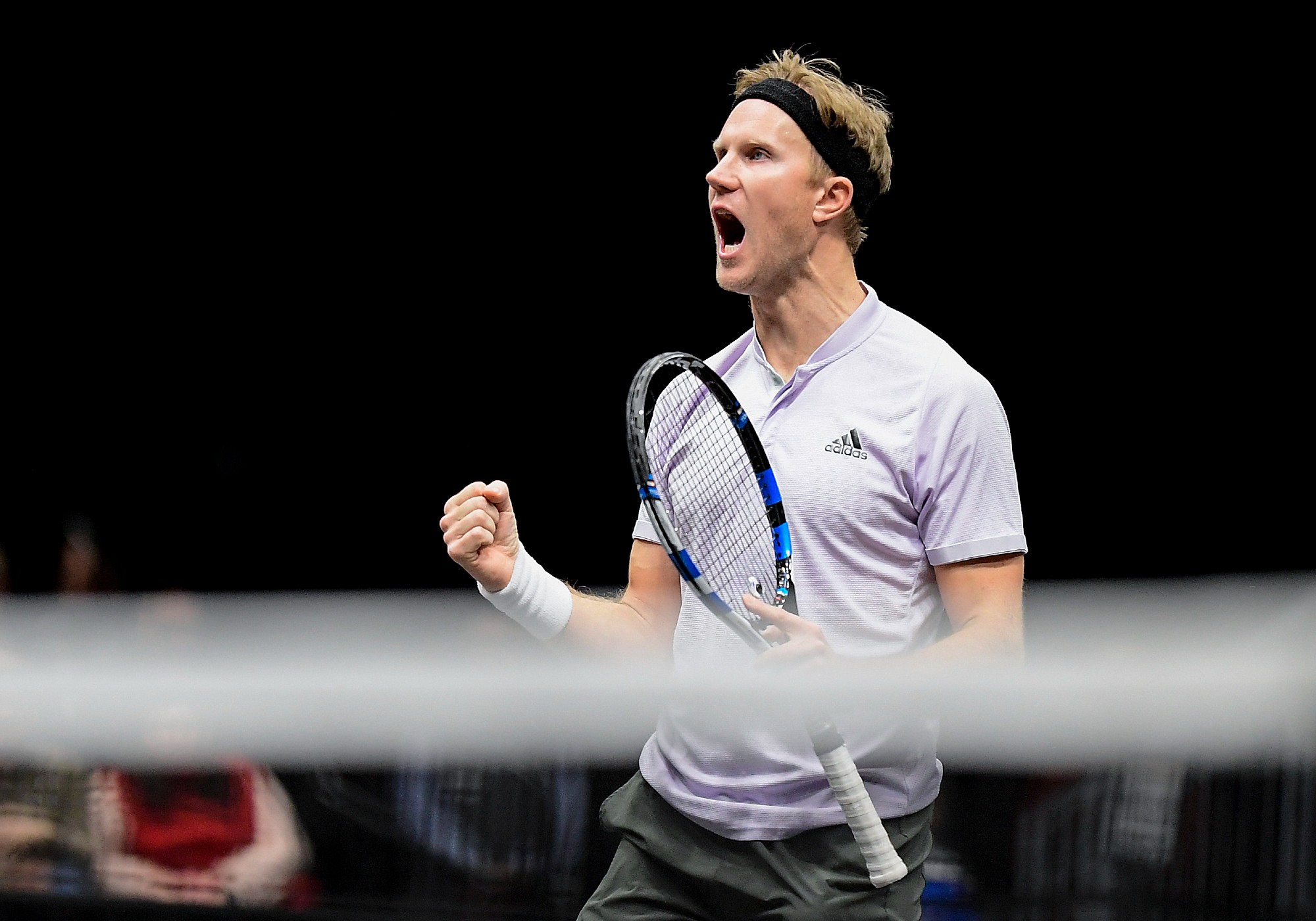  Dominic Inglot of Great Britain celebrates championship point in his Men's Double's final match against Steve Johnson and Reilly Opelka of the United States on day seven of the 2020 NY Open at Nassau Veterans Memorial Coliseum on February 16, 2020 