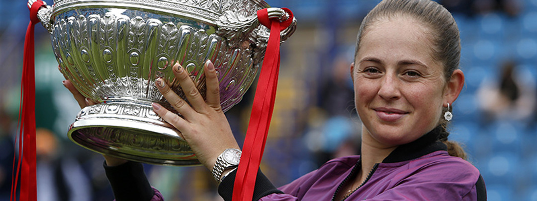 Jelena Ostapenko women's champion holding the 2021 Eastbourne trophy