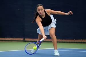Annabel Wong reaching to pick up a forehand at the Lexus Junior National Championships