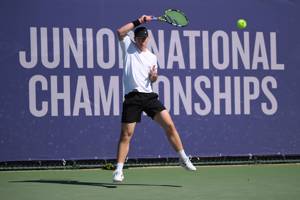 Liam Channon whips a forehand during a match at the Lexus Junior National Championships
