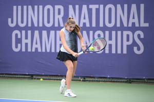 Liv Zingg connects on a backhand at the Lexus Junior National Championships