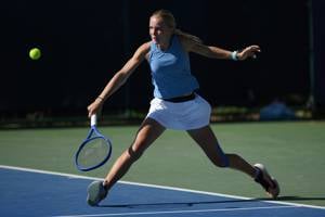 Ophelia Korpanec Davies steps into a backhand volley at the Lexus Junior National Championships