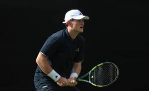 Rhys Lawlor in the ready position before a point in a match at the Lexus Junior National Championships