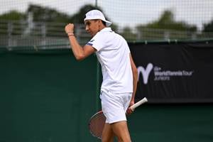 Vincent Fletcher pumps his fist after winning a point at the Lexus British Open Roehampton