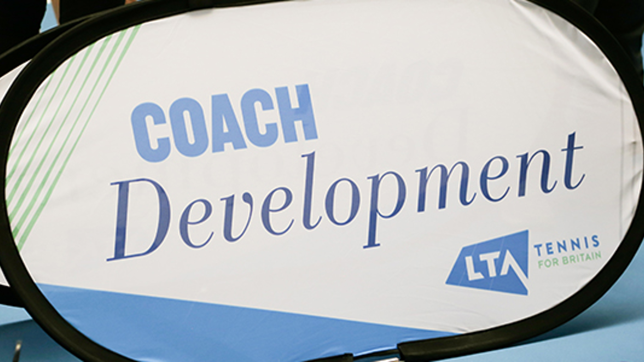 close up of coach development lta tennis banner