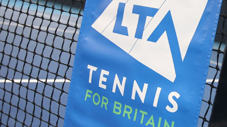 tennis net with LTA branding on