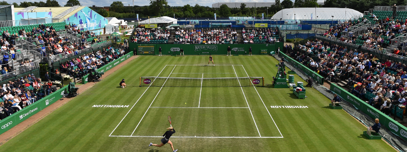 Players on grass tennis court during the Nottingham Open