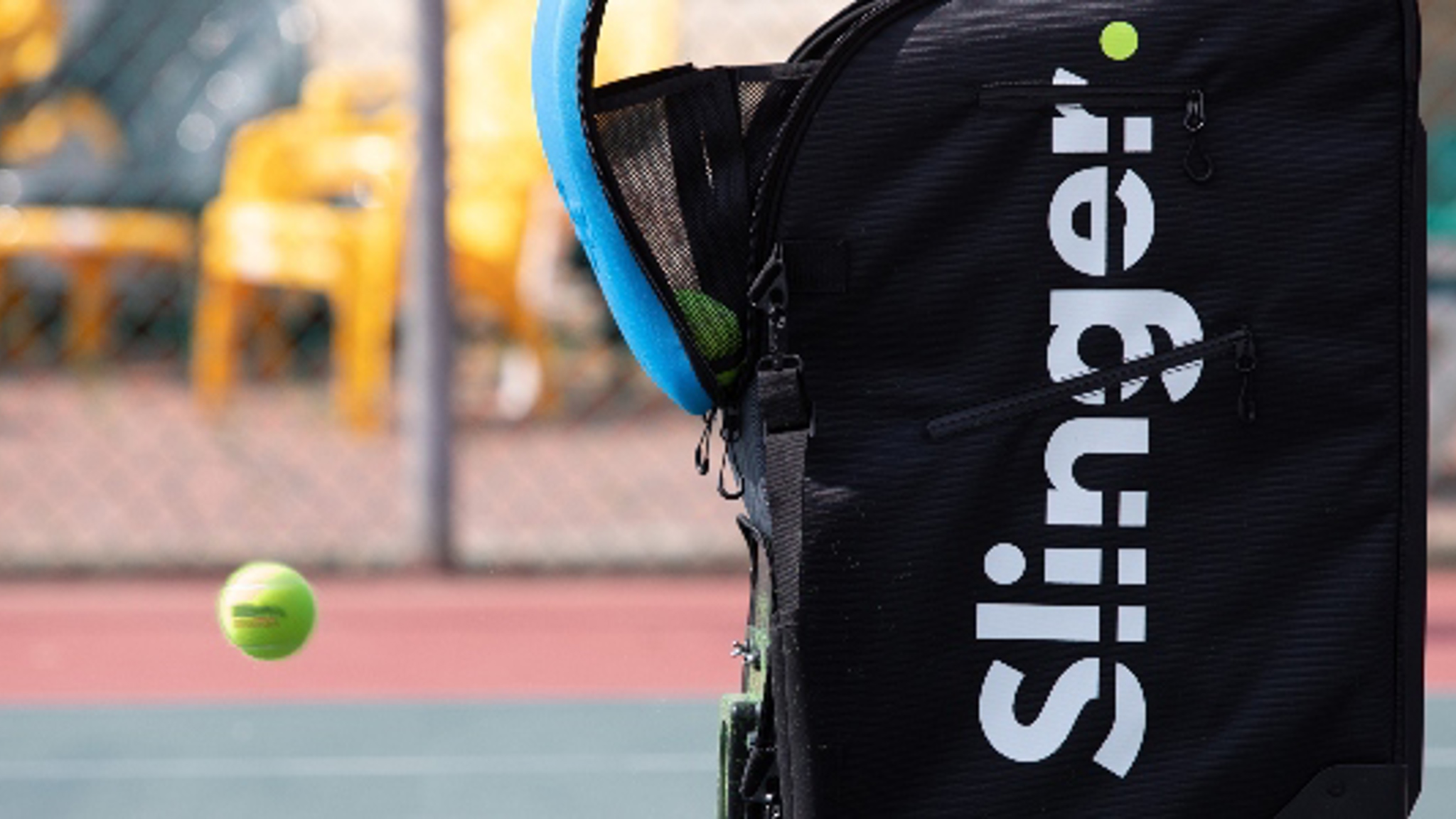 Close up of a Slinger bag on a tennis court