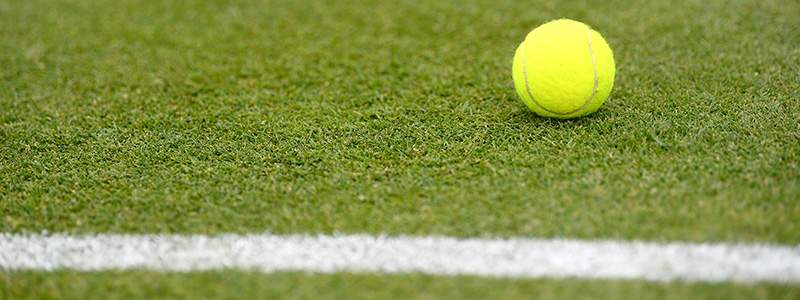 Tennis ball on a tennis court