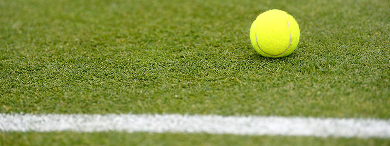Tennis ball on a tennis court