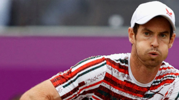 close up of andy murray on court looking serious about to play a shot 