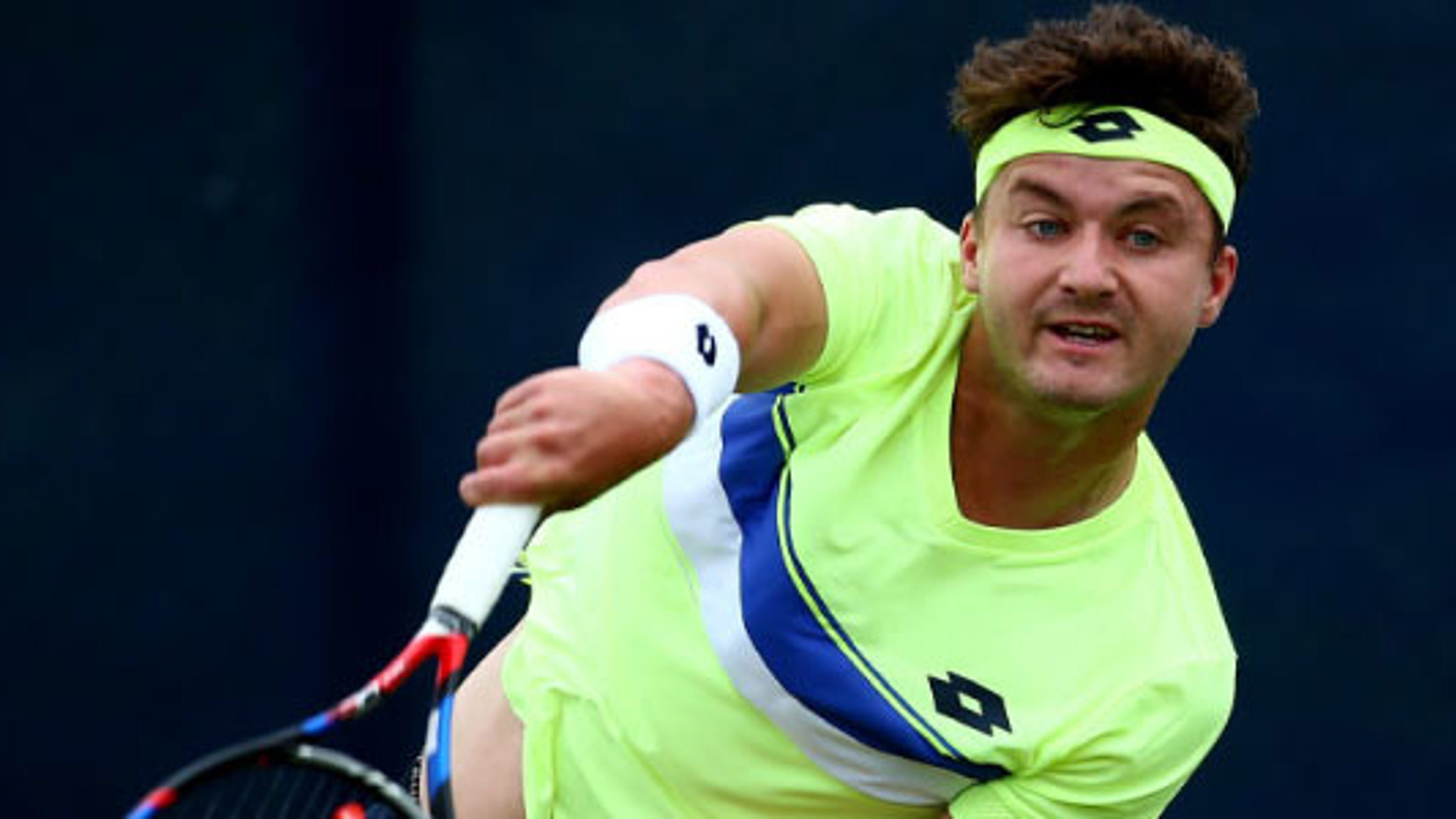 close up image of jonny o mara serving a ball