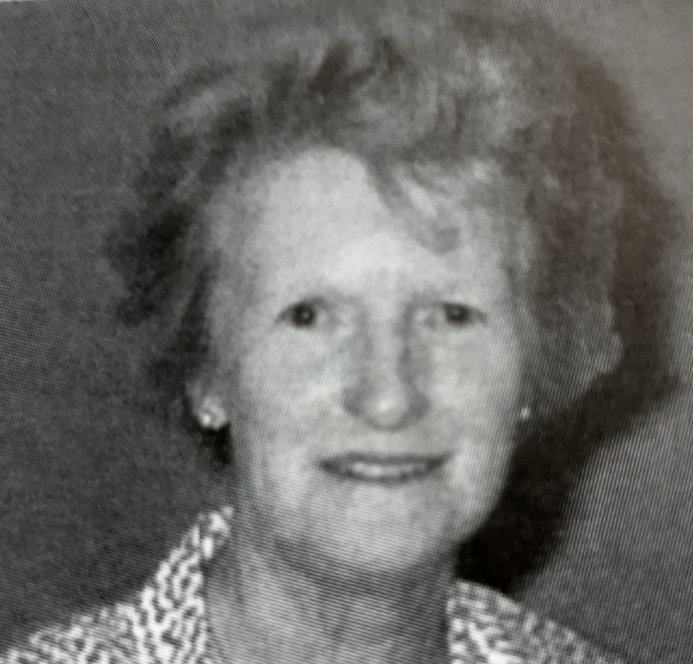 A black and white portrait photos of Lorna Hamilton.