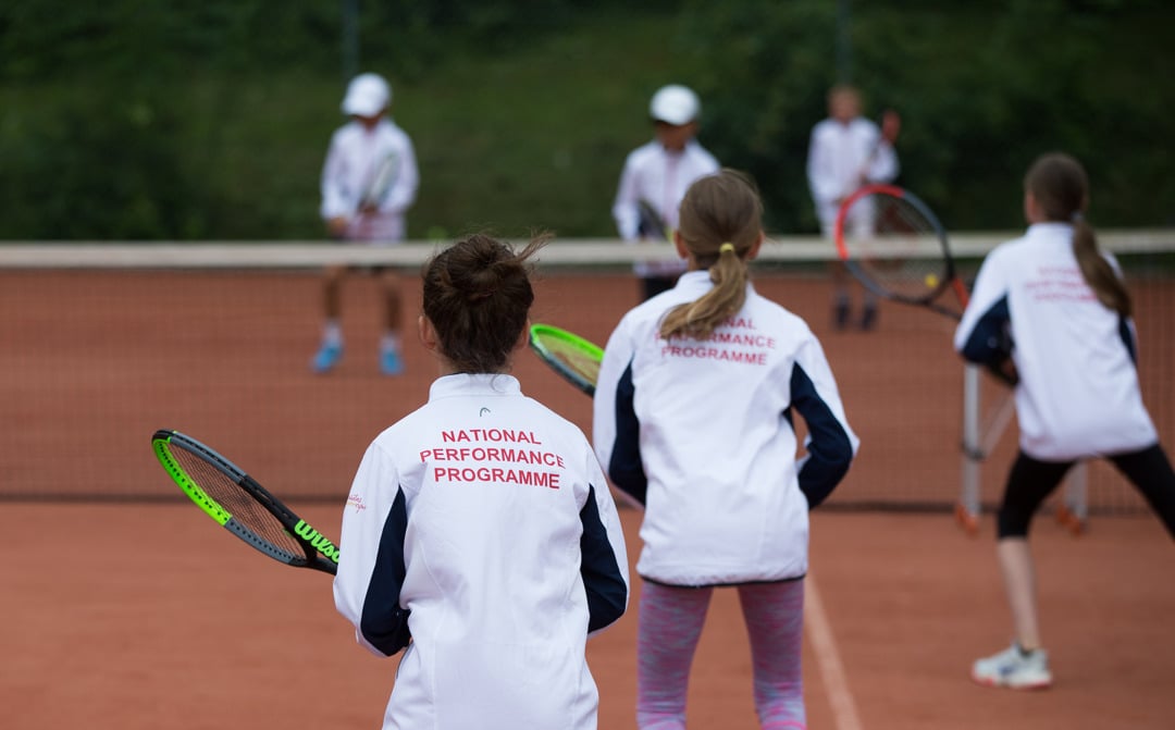 youth tennis lesson taking place at the national performance programme