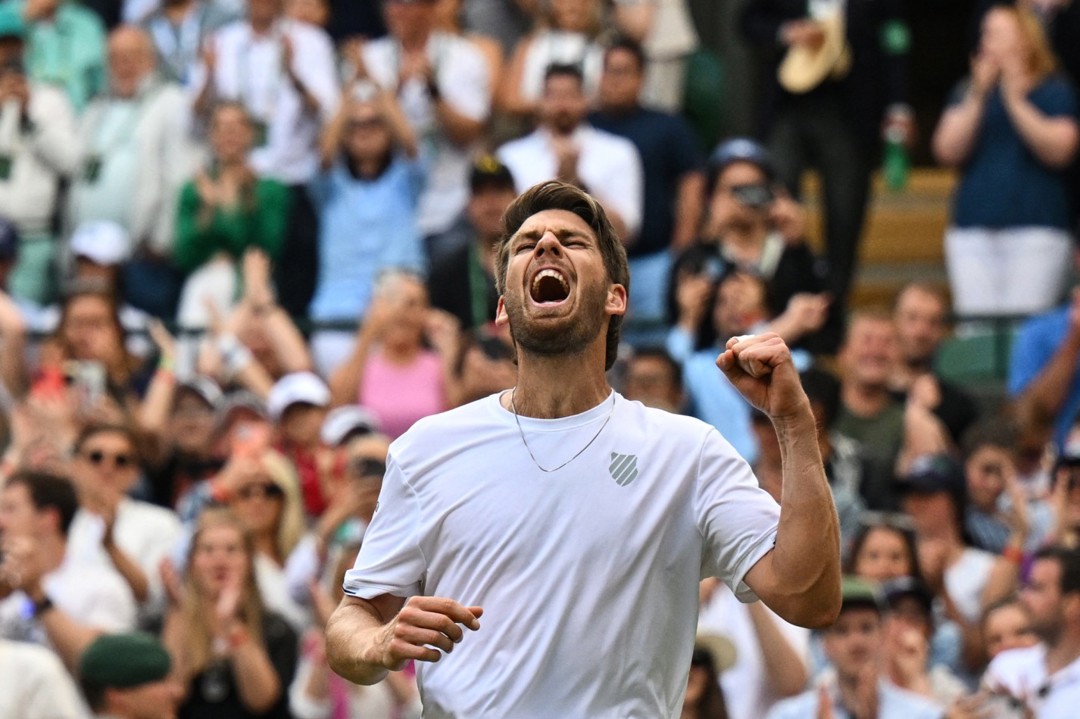 Cam Norrie cheers his fourth round win at Wimbledon