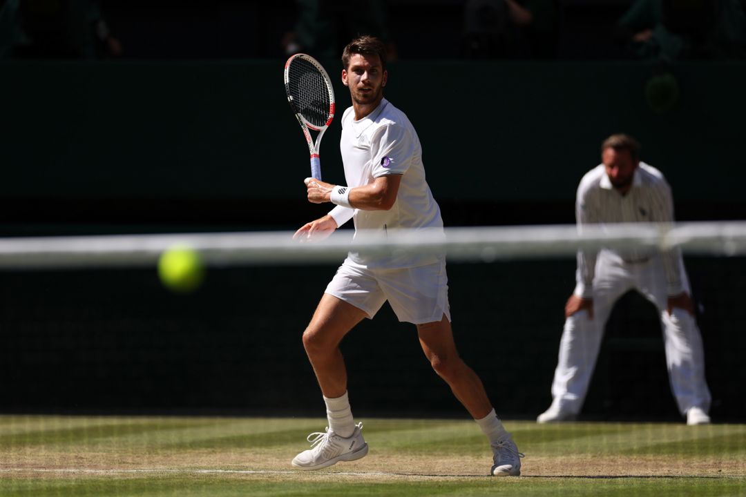 Cam Norrie hits a forehand in the Wimbledon semi-final