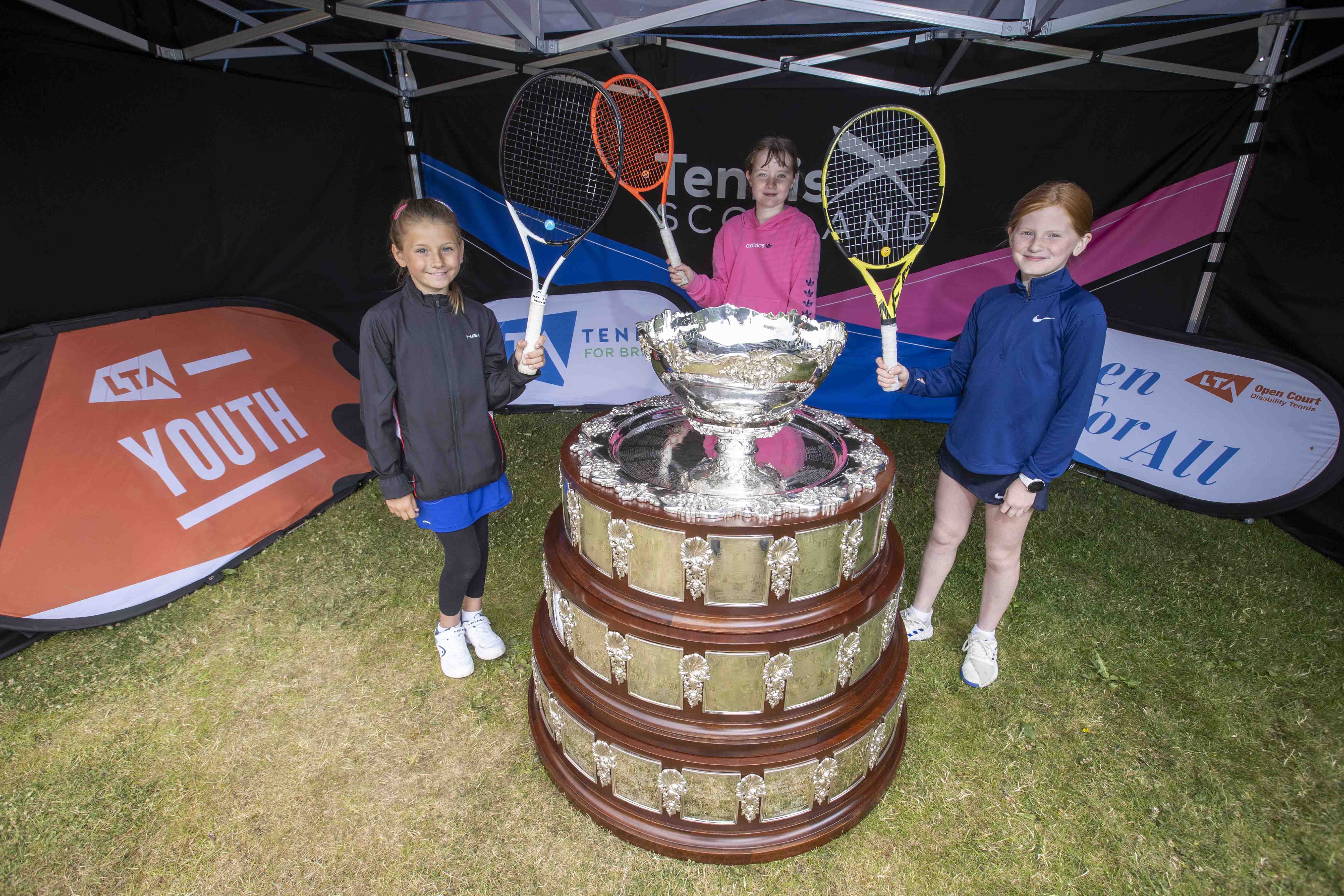 Craiglockhart tennis players with the Davis Cup trophy
