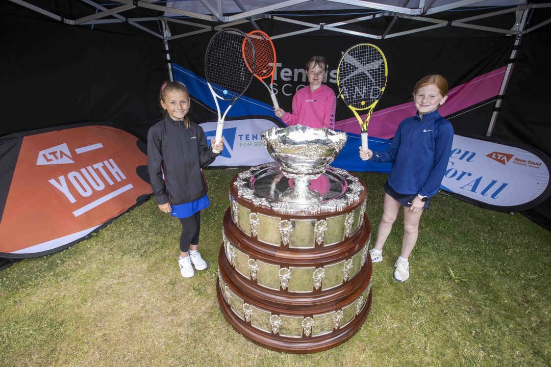 Craiglockhart tennis players with the Davis Cup trophy