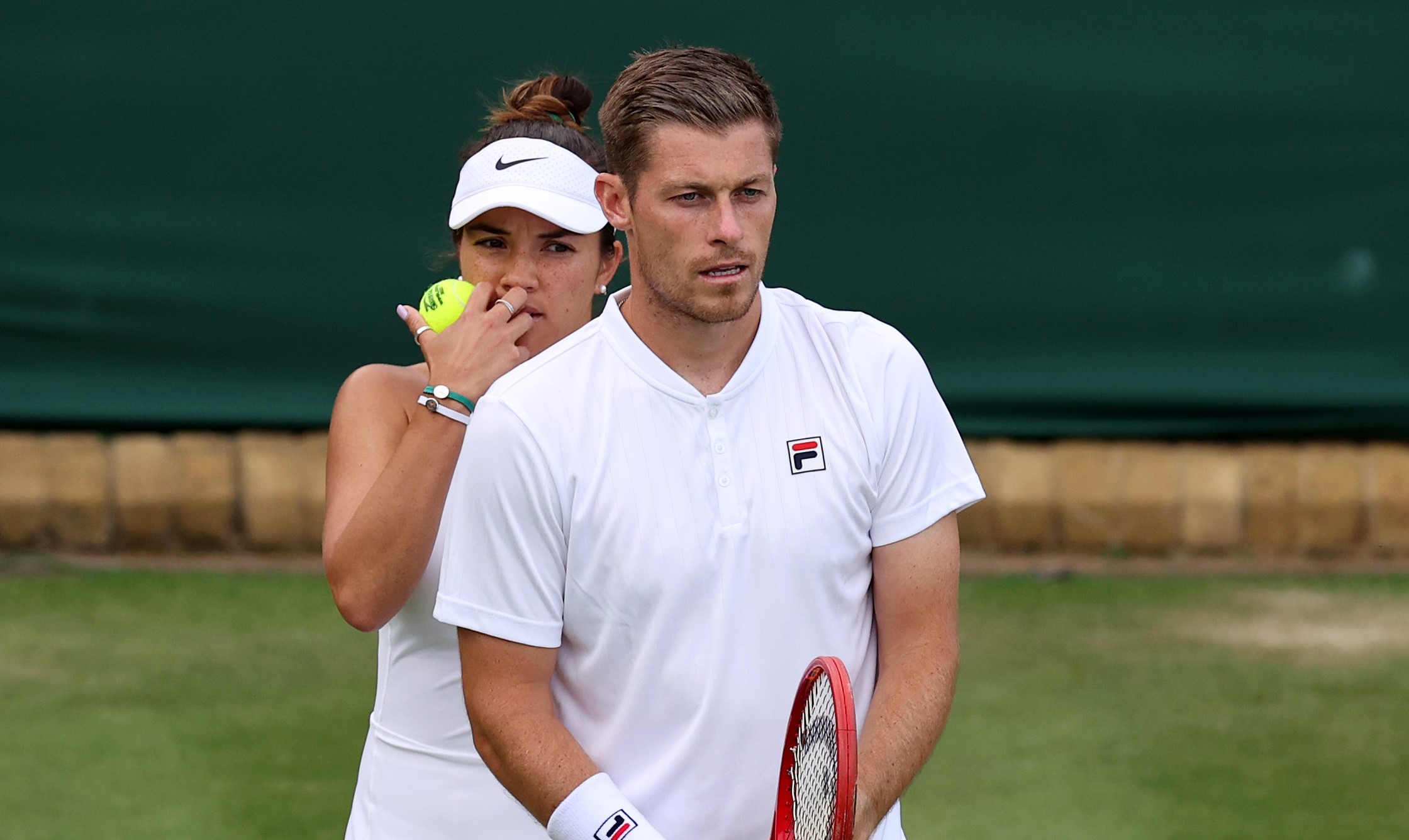 Neal Skupski and Desirae Krawczyk during their Mixed Doubles First Round match on day six of The Championships Wimbledon 2022 