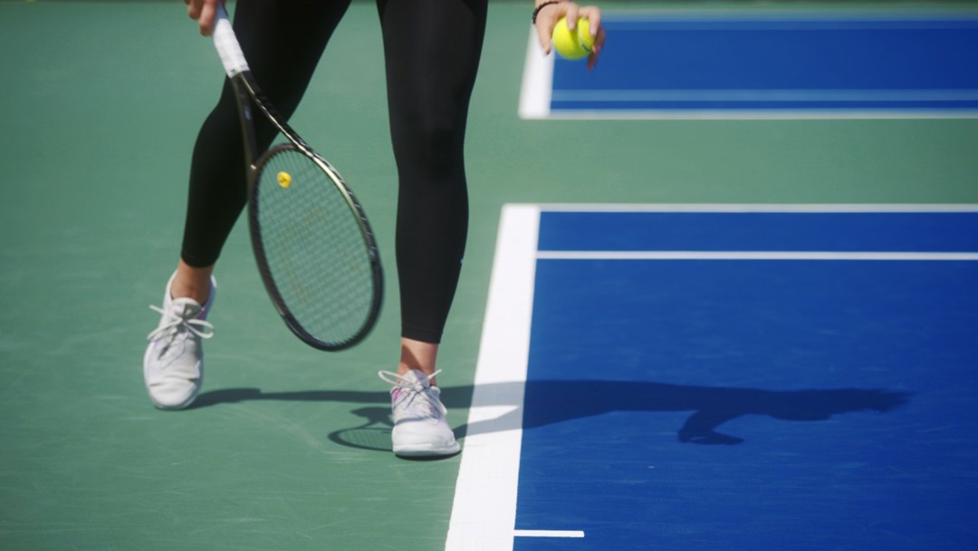 General shot of a player serving
