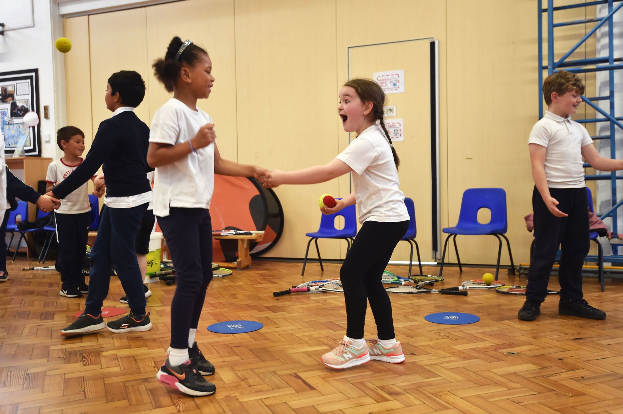 Pupils of Haydn Primary School pictured enjoying their LTA Youth coaching session