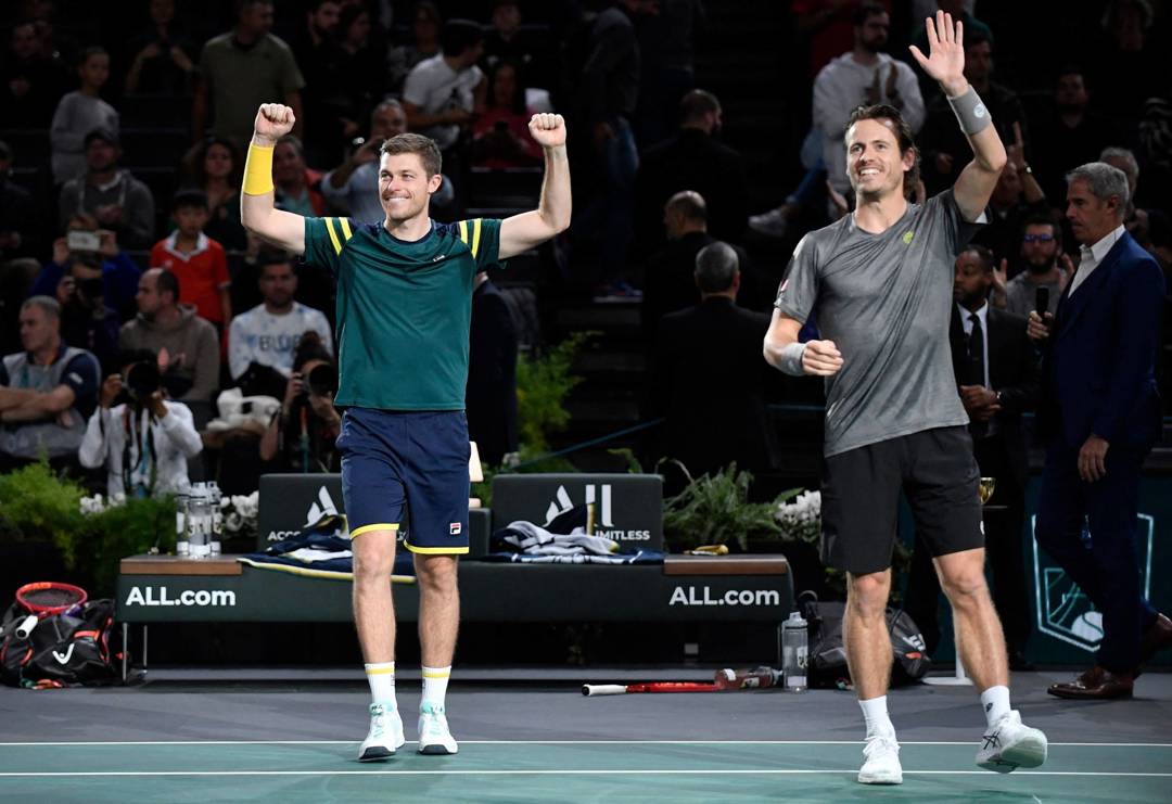 Neal Skupski and Wesley Koolhof celebrate winning the Rolex Paris Masters 2022
