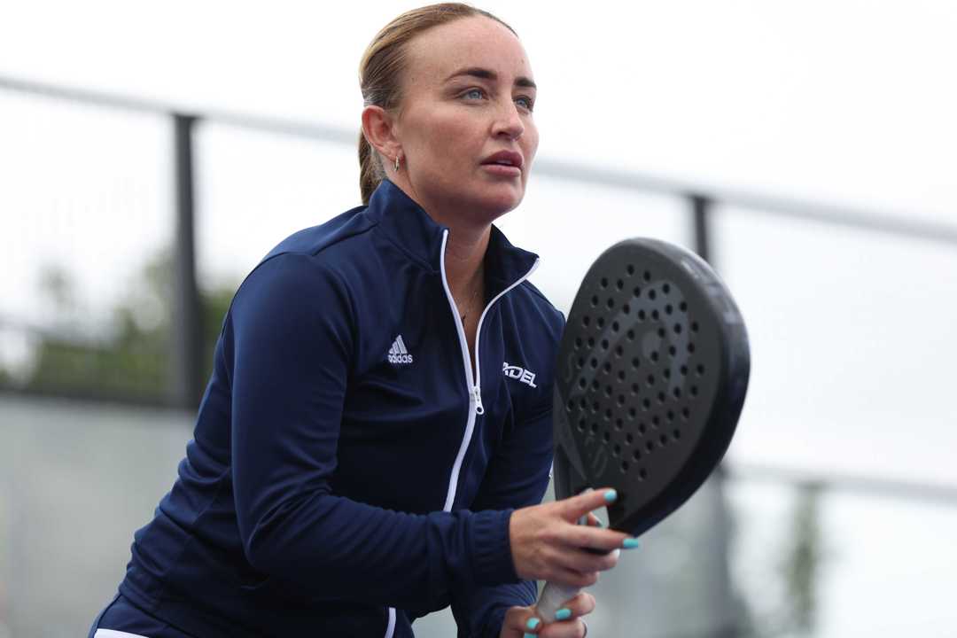 Great Britain's Aimee Gibson holding a padel racket on court waiting for a shot
