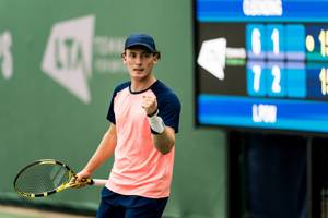 Luca Pow fist pumps after winning the 18U Junior National Championships