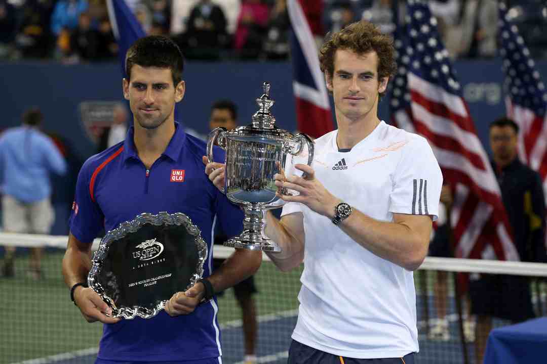 Andy Murray lifting his maiden Grand Slam title alongside Novak Djokovic at the 2012 US Open
