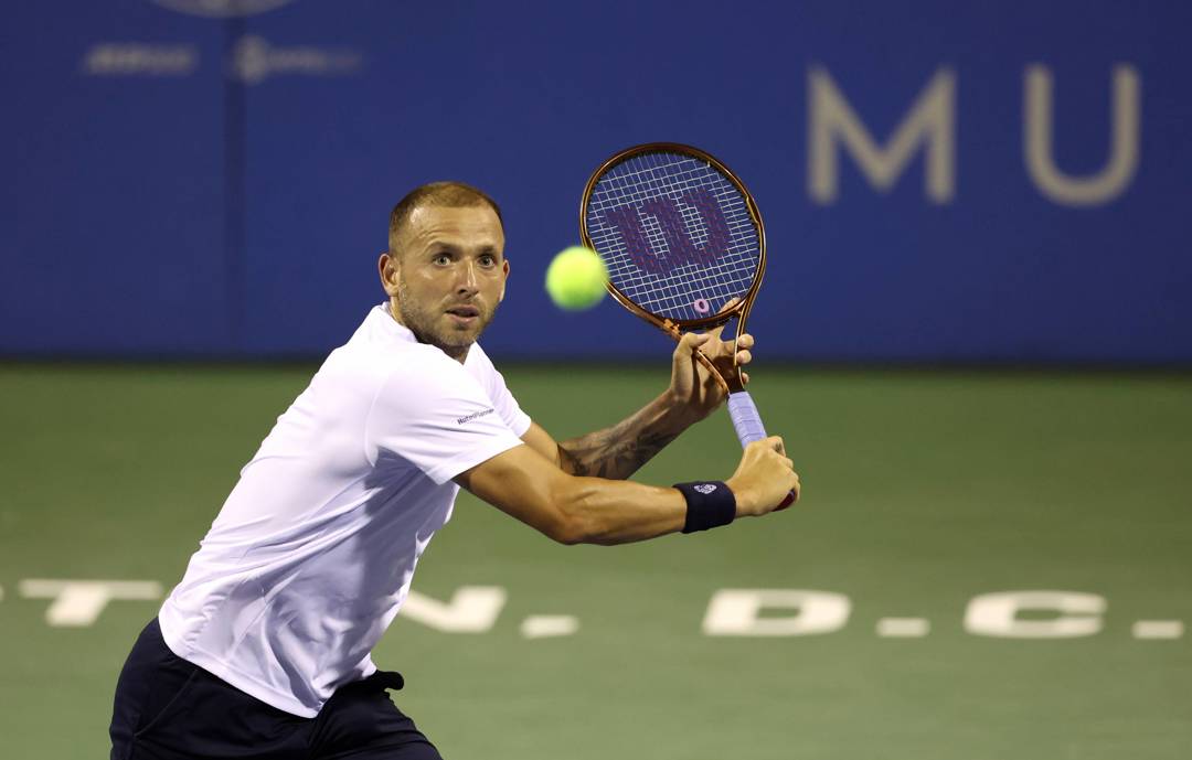 Dan Evans lines up a volley in the Citi Open