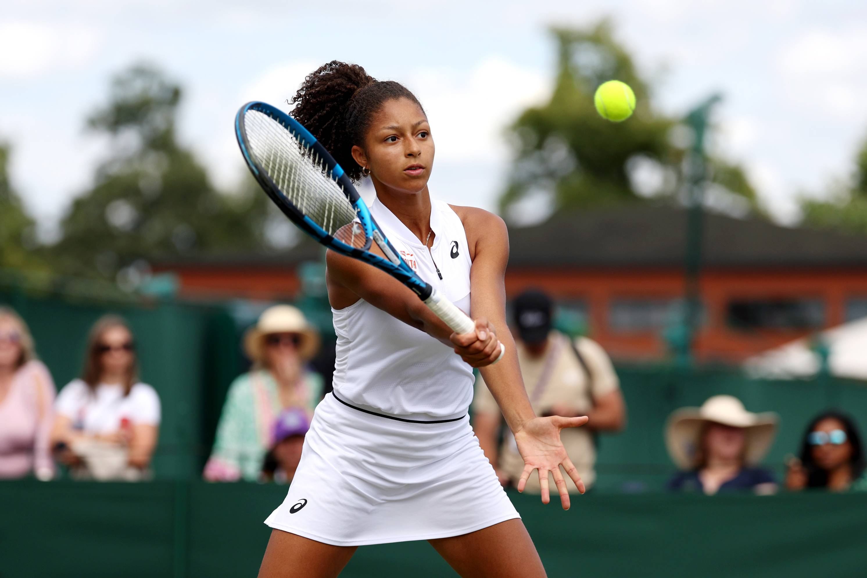 Britain's Ranah Stoiber hits a volley at Junior Wimbledon 2023
