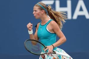 Hannah Klugman celebrates winning a point at the US Open Juniors