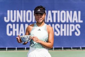 Mimi Xu with the trophy at the 18U Lexus Junior National Championships
