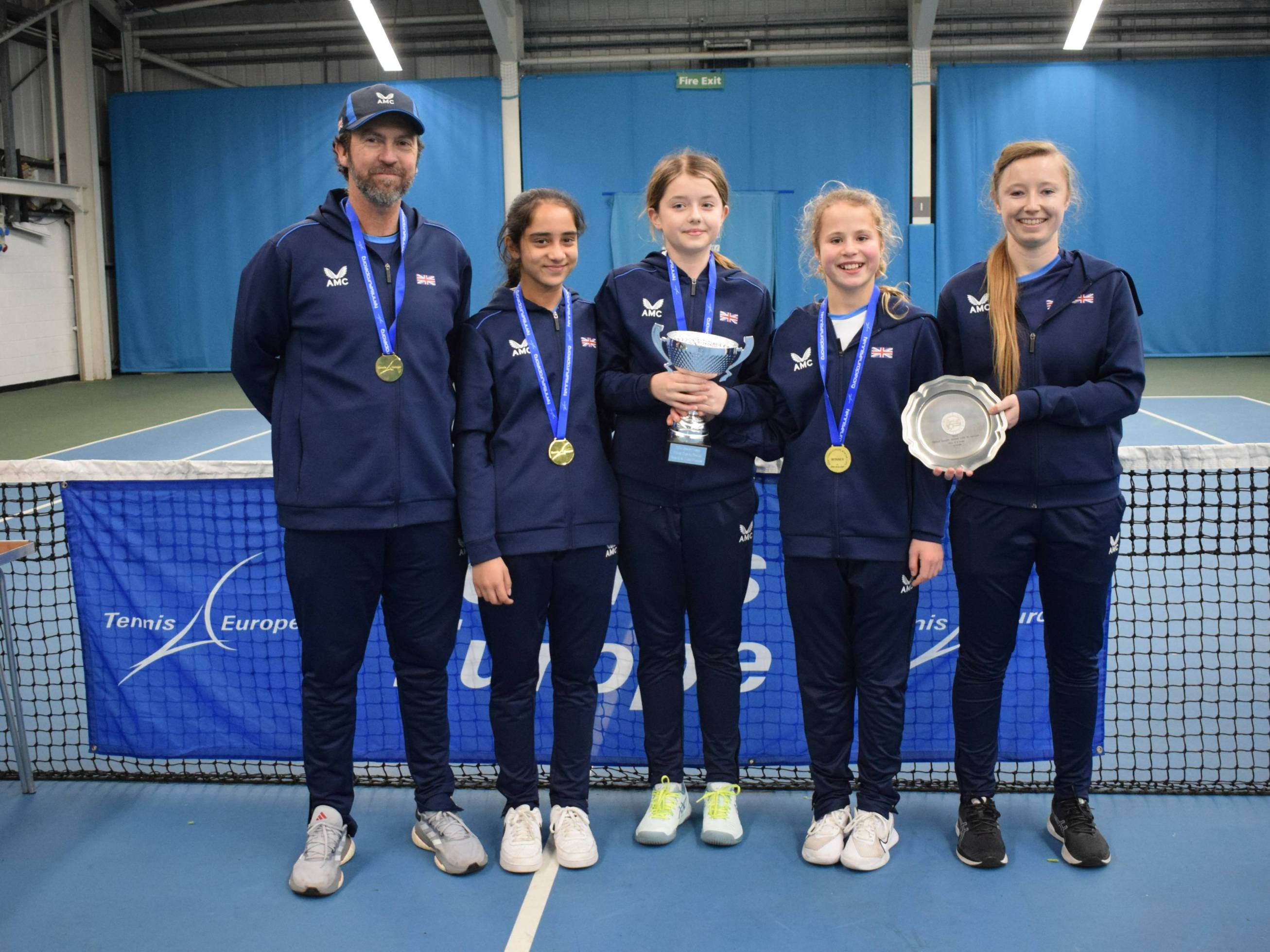 The 12U GB girls team with the Winter Cup trophy in Sunderland