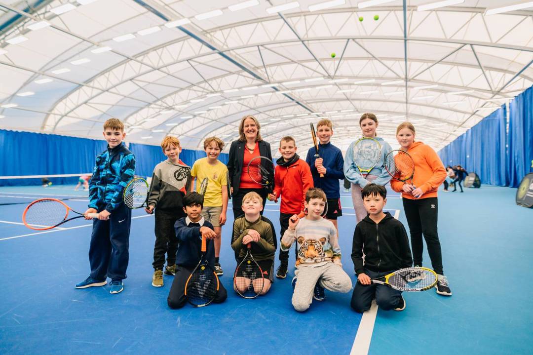 Kids on court at the opening of the Oriam Indoor Tennis Centre