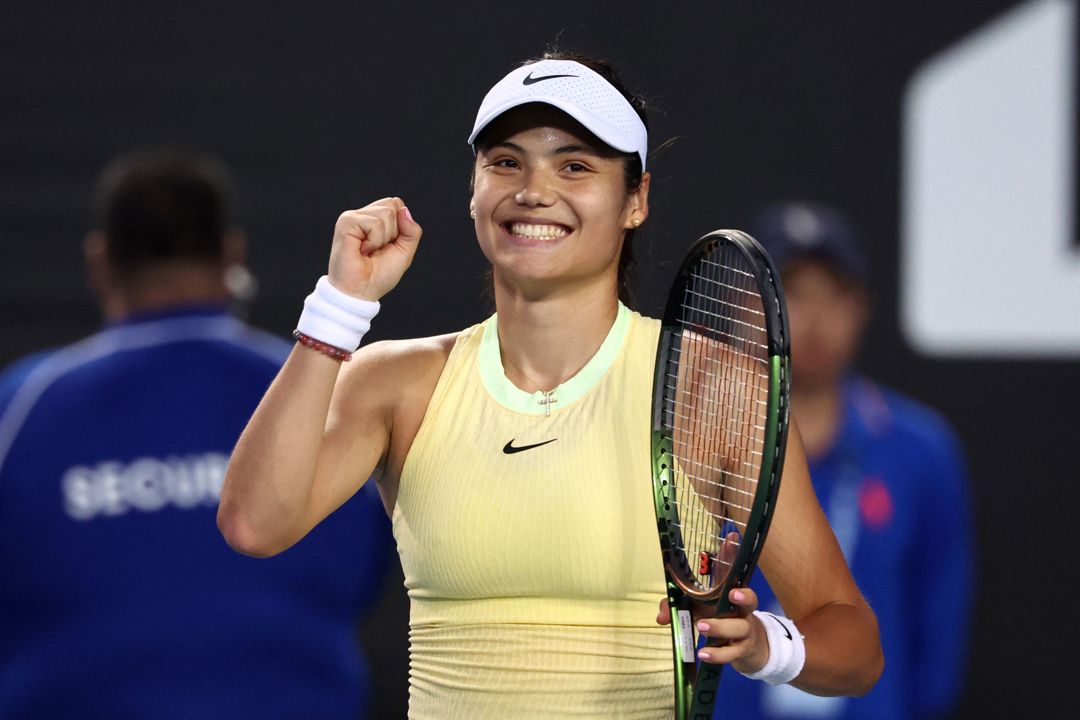 Emma Raducanu clenching her first in celebration after winning her opening round match at the Australian Open