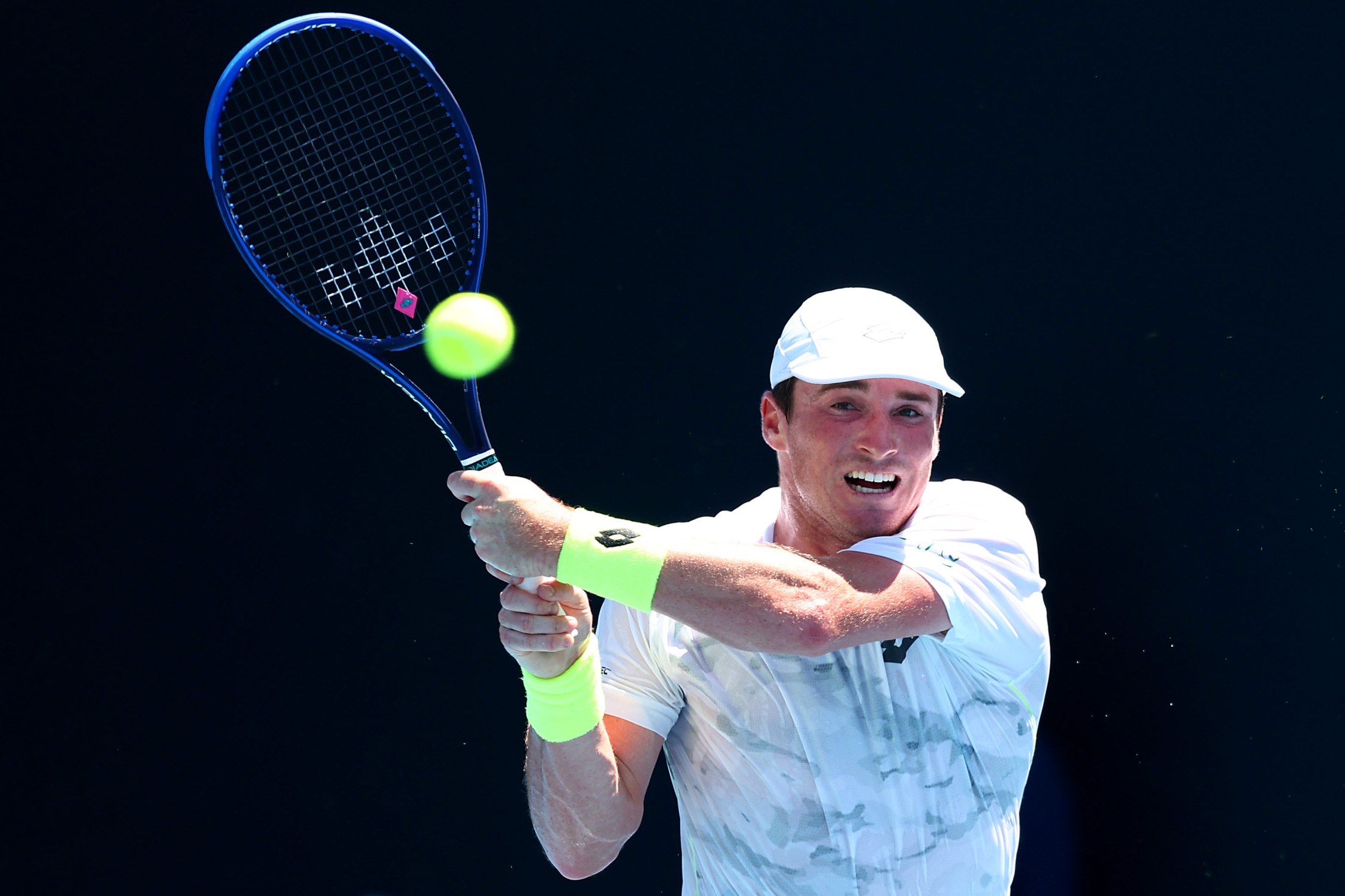 Oliver Crawford hitting a backhand at the Australian Open 2024