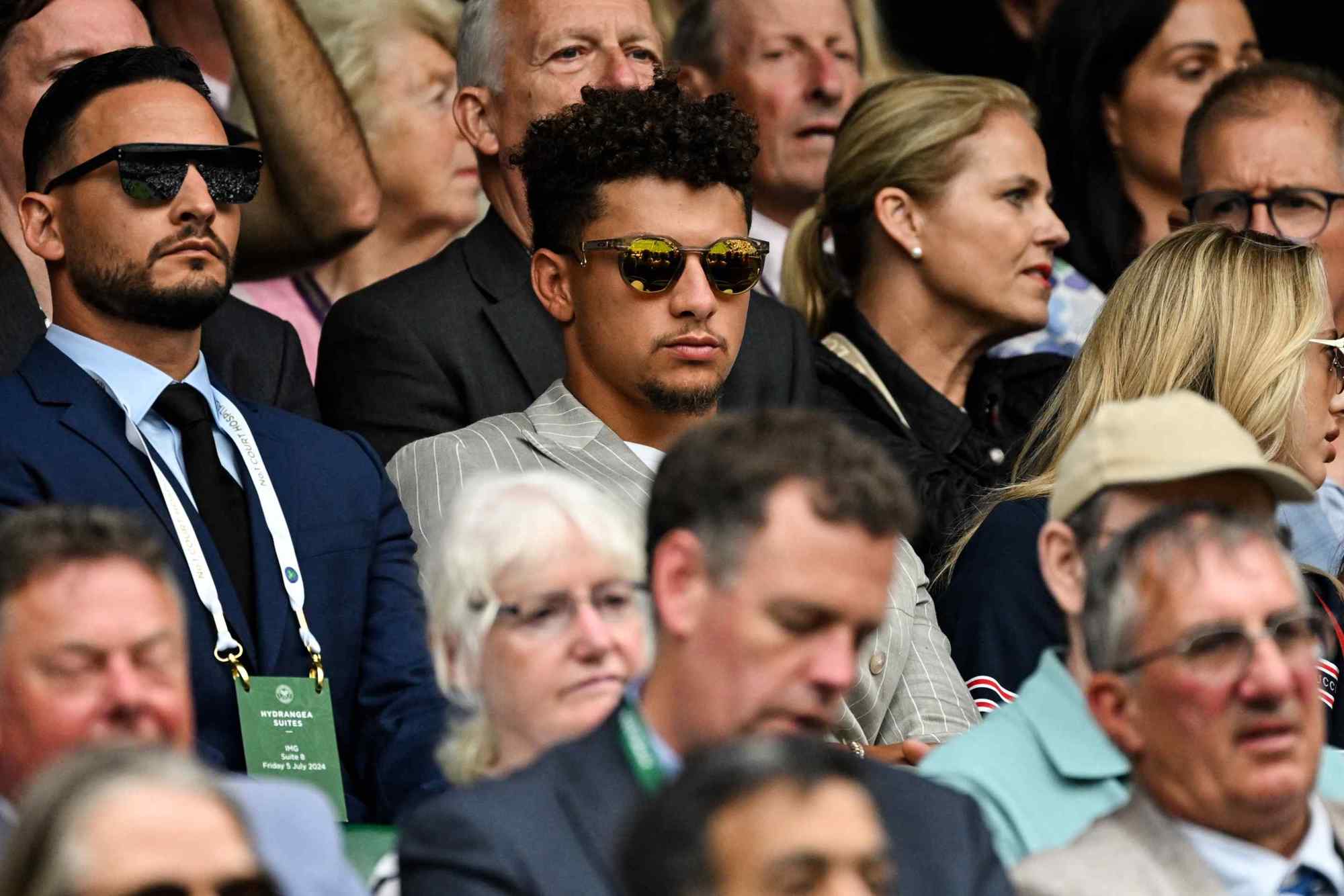 Patrick Mahomes sat amongst the crowd at Wimbledon while wearing sunglasses
