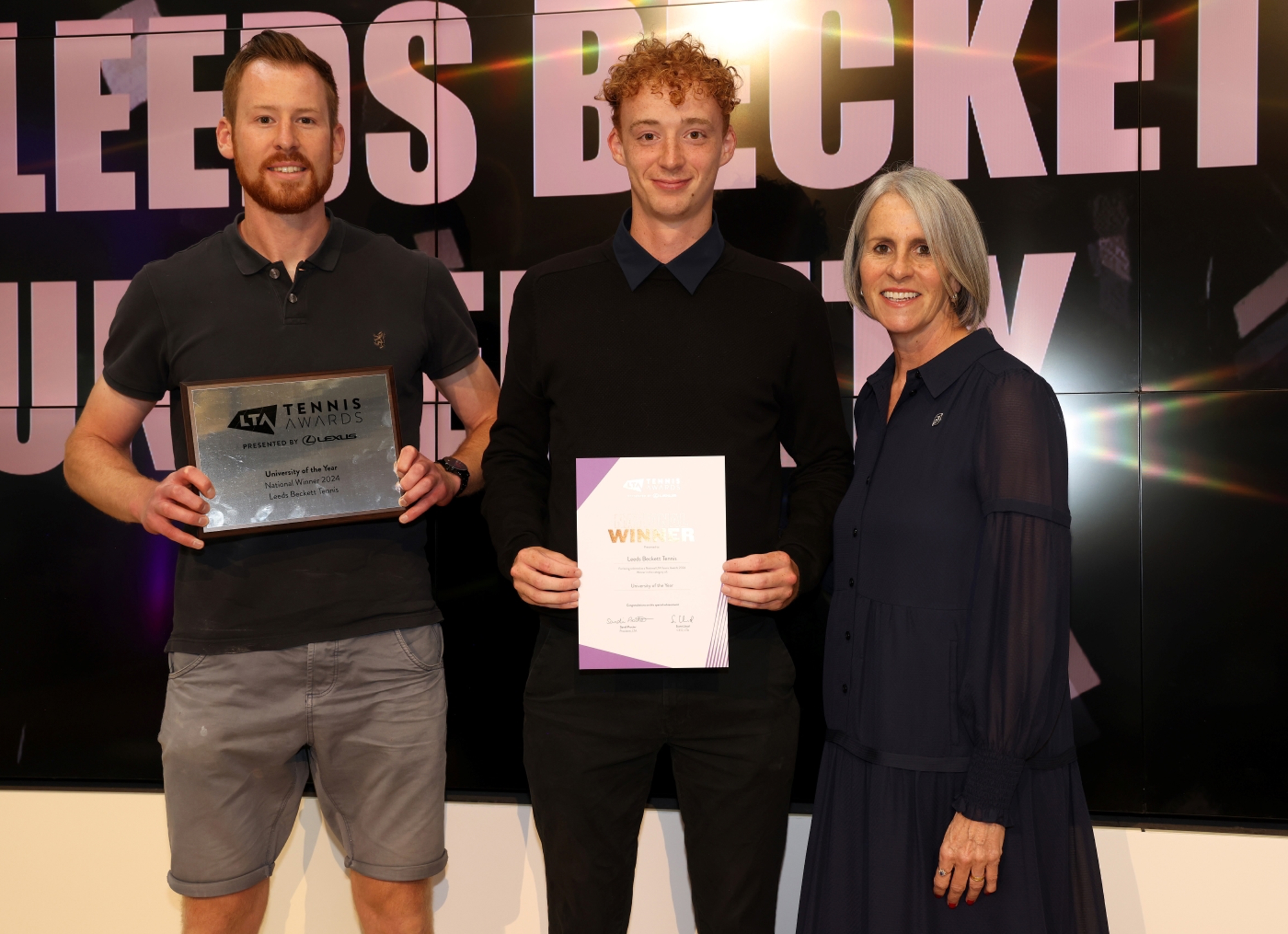 Leeds Beckett representatives posing with their University of the Year award