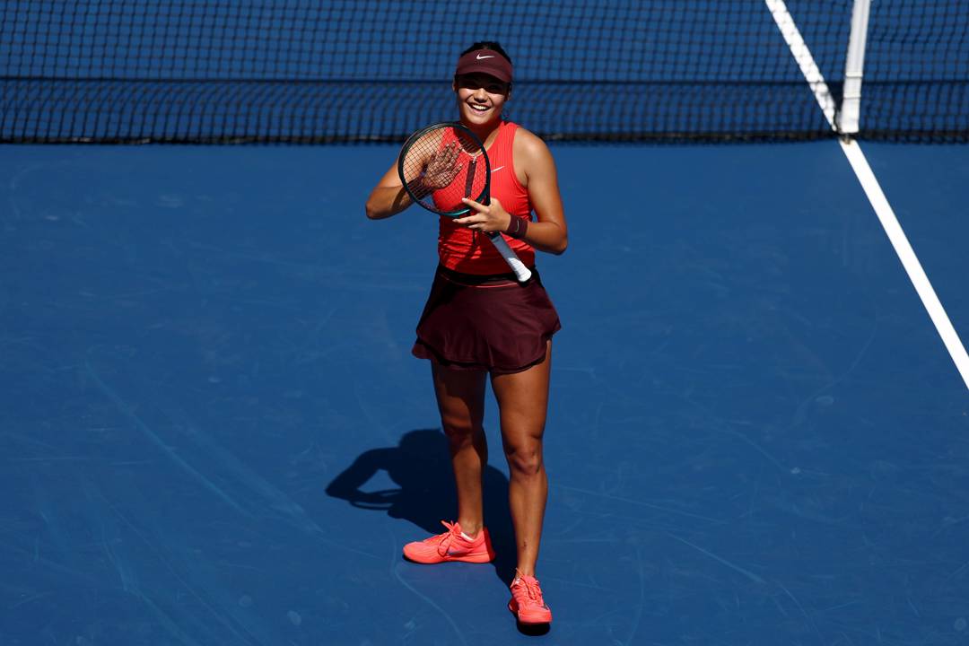Emma Raducanu applauds the crowd after a first round win at the 2025 US Open