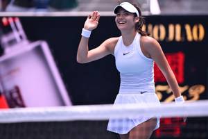 Emma Raducanu waves to the crowd after her second round win at the Australian Open 2025